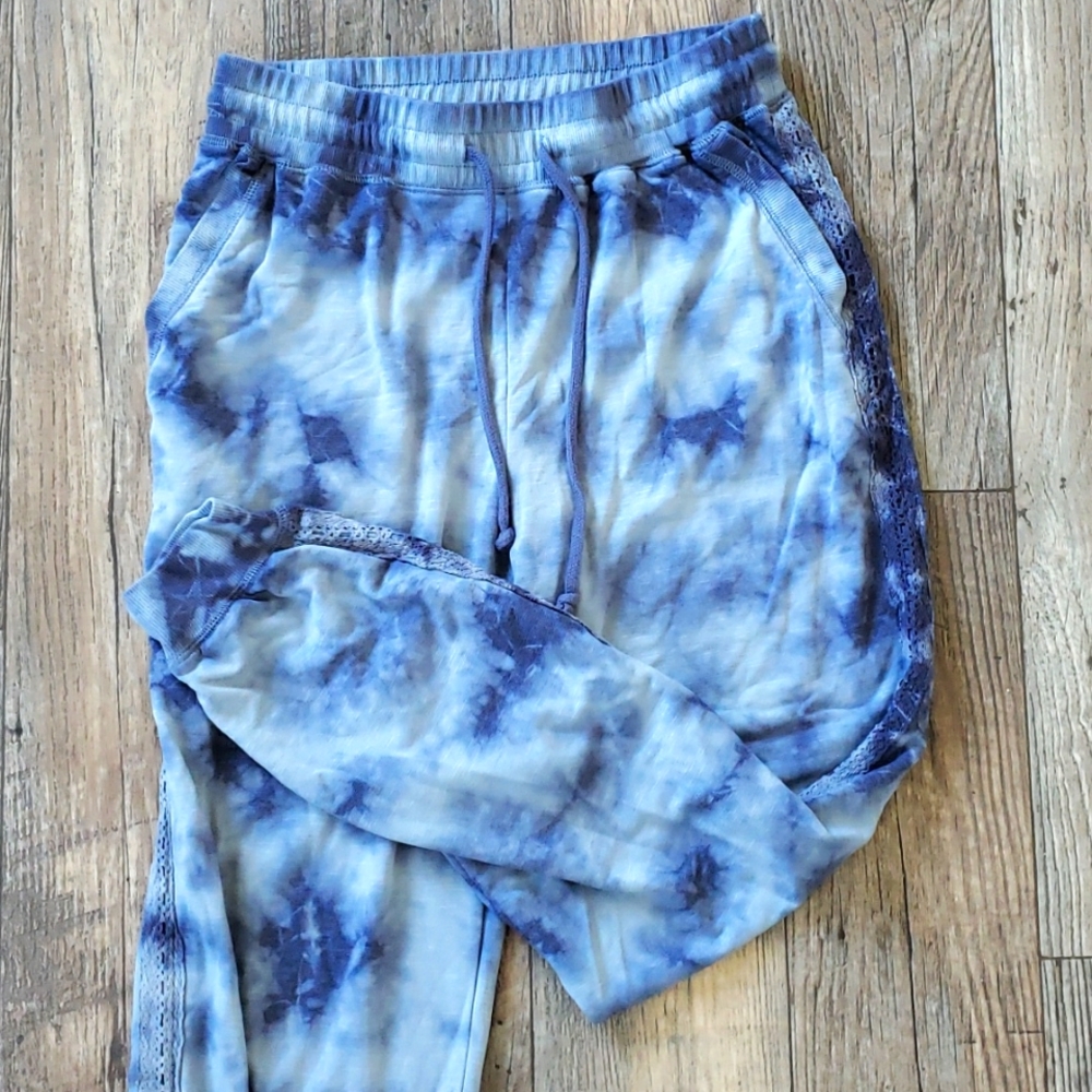 Blue joggers with lace accents